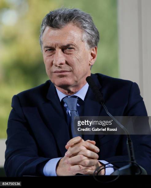President of Argentina Mauricio Macri looks on during a press conference as part of the official visit of Jim Yong Kim President of The World Bank at...