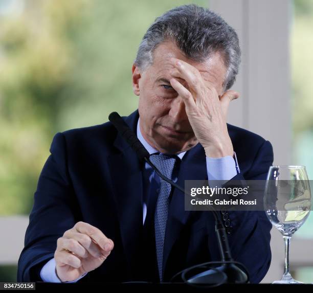 President of Argentina Mauricio Macri gestures during a press conference as part of the official visit of Jim Yong Kim President of The World Bank at...