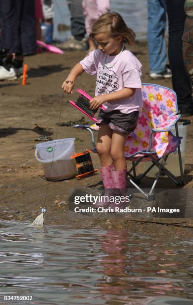 Competitor taking part in the annual British Crabbing Championships at Walberswick, Suffolk.