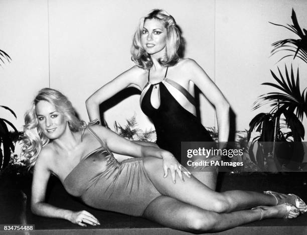 Tessa Hewitt models a Vino-one-Shoulder swimsuit in body hugging in shimmering nylon and lycra in vino, black or mid-blue. Gillian Duxbury models a...