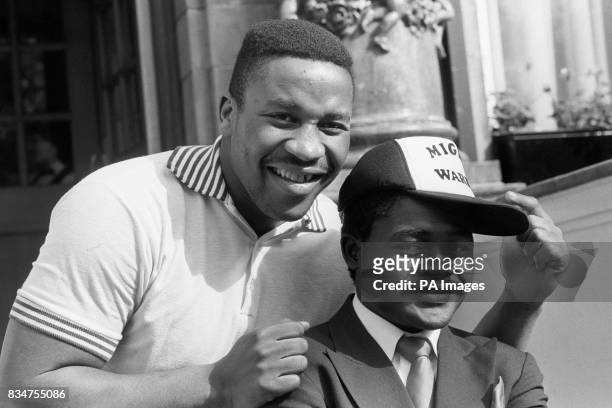 Heavyweight Tim Witherspoon with Featherweight Azumah Nelson.