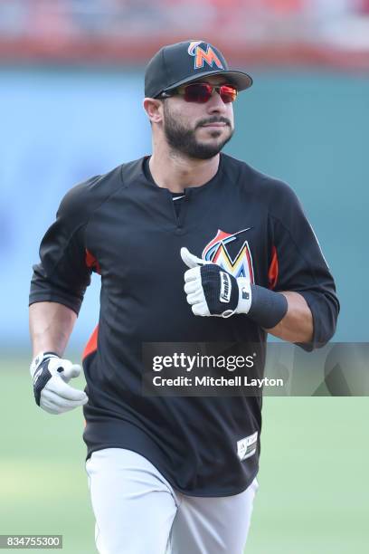 Mike Aviles of the Miami Marlins looks on during batting practice of a baseball game against the Washington Nationals at Nationals Park on August 9,...