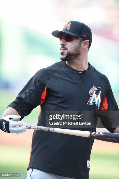 Mike Aviles of the Miami Marlins looks on during batting practice of a baseball game against the Washington Nationals at Nationals Park on August 9,...