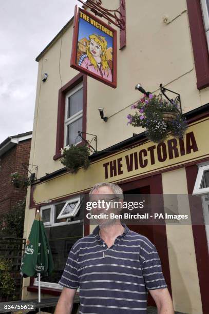 Pub owner Peter Gower-Crane stands outside his pub The Victoria in St Werburghs, Bristol, which has caused controversy by swapping a sign of Queen...