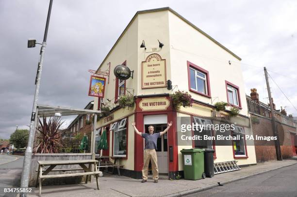Pub owner Peter Gower-Crane stands outside his pub The Victoria in St Werburghs, Bristol, which has caused controversy by swapping a sign of Queen...