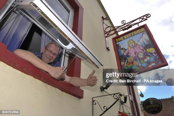 Pub owner Peter Gower-Crane stands outside his pub The Victoria in St Werburghs, Bristol, which has caused controversy by swapping a sign of Queen...