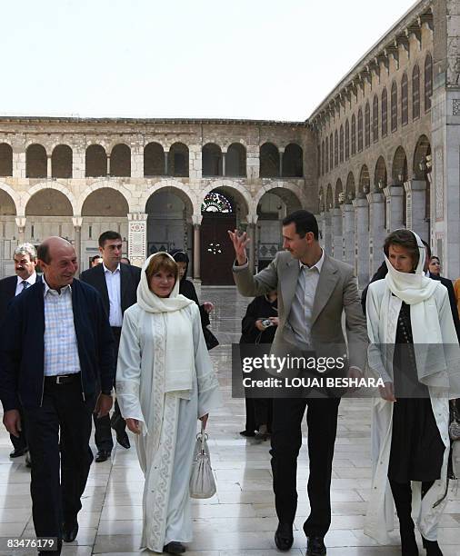 Romanian President Traian Basescu , Syrian President Bashar al-Assad , Romanian first lady Maria and her Syrian counterpart Asma visit the Omayyad...