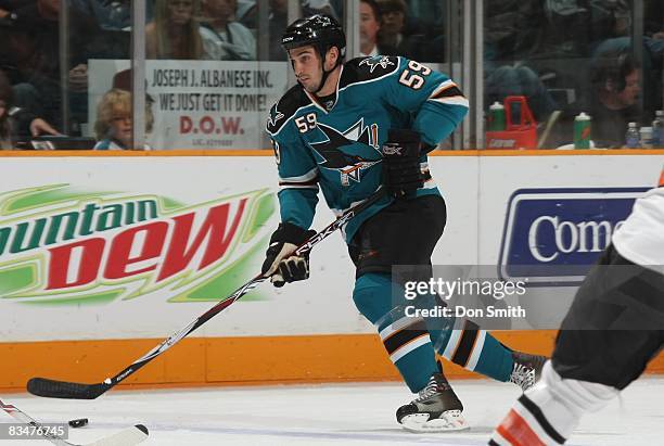 Brad Staubitz of the San Jose Sharks skates with the puck during an NHL game against the Philadelphia Flyers on October 18, 2008 at HP Pavilion at...