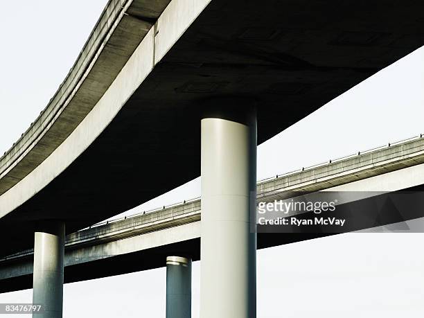 elevated roads converging. - overpass stock pictures, royalty-free photos & images
