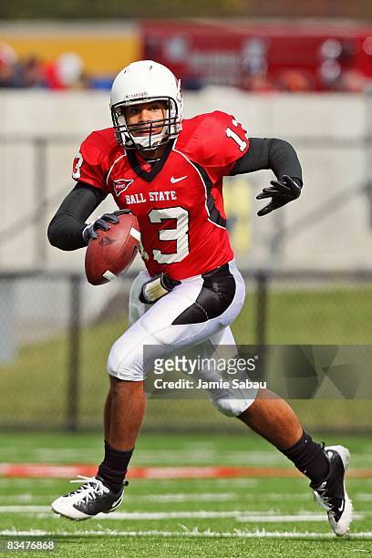 Quarterback Nate Davis of the Ball State Cardinals runs with the ball against the Eastern Michigan Eagles on October 25, 2008 at Scheumann Stadium in...