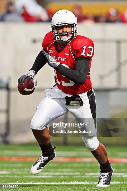 Quarterback Nate Davis of the Ball State Cardinals runs with the ball against the Eastern Michigan Eagles on October 25, 2008 at Scheumann Stadium in...