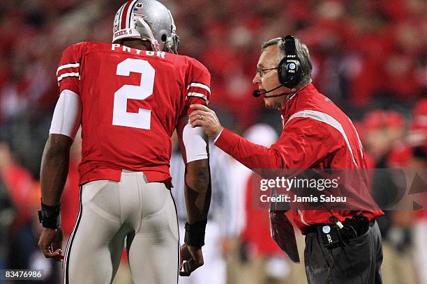 Ohio State Buckeyes head coach Jim Tressell instructs his quarterback Terrell Pryor during the game against the Penn State Nittany Lions on October...