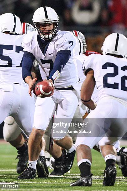Quarterback Pat Devlin of the Penn State Nittany Lions hands off the ball against the Ohio State Buckeyes on October 25, 2008 at Ohio Stadium in...