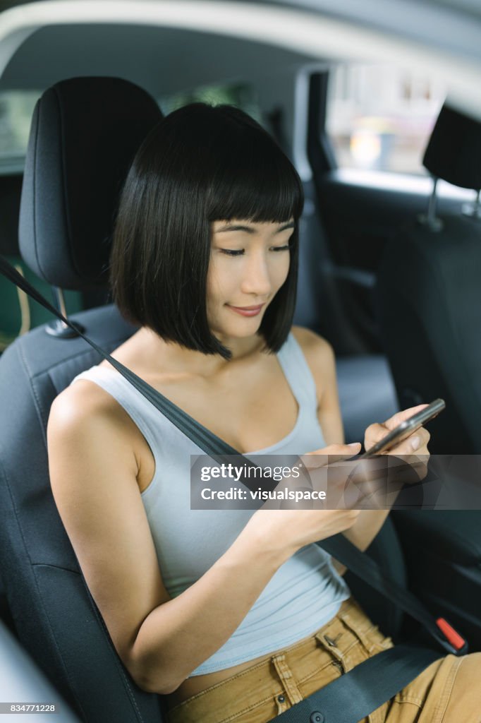 Young Woman using Technology