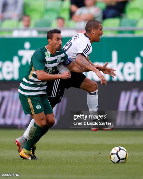 Leandro De Almeida 'Leo' of Ferencvarosi TC fouls Myke Bouard Ramos of Swietelsky Haladas during the Hungarian OTP Bank Liga match between...