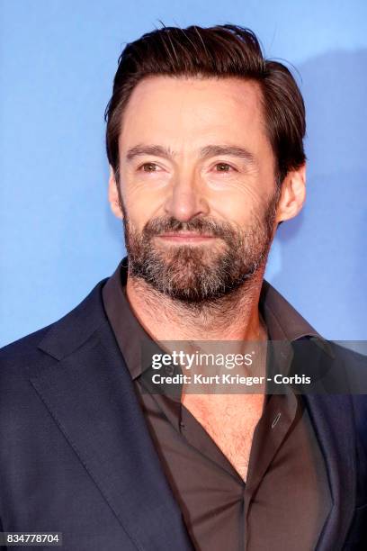 Image has been digitally retouched.) Hugh Jackman arrives at the 'Eddie the Eagle' premiere in Munich, Germany on March 20, 2016.