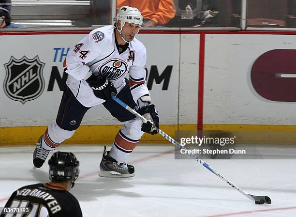 Sheldon Souray of the Edmonton Oilers handles the puck against the Anaheim Ducks on October 15, 2008 at the Honda Center in Anaheim, California. The...