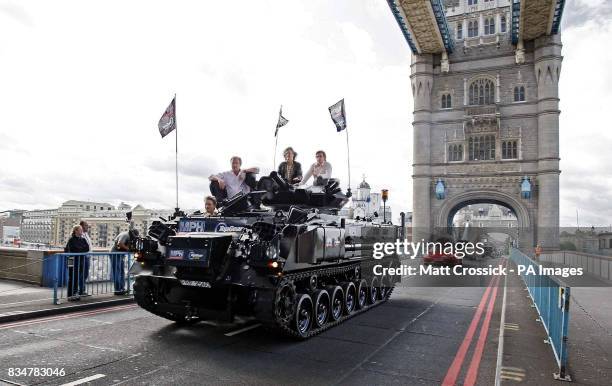 Top Gear presenters, Jeremy Clarkson, James May and Richard Hammond, are driven across Tower Bridge in a stretched 434 Armoured Personel Carrier, to...