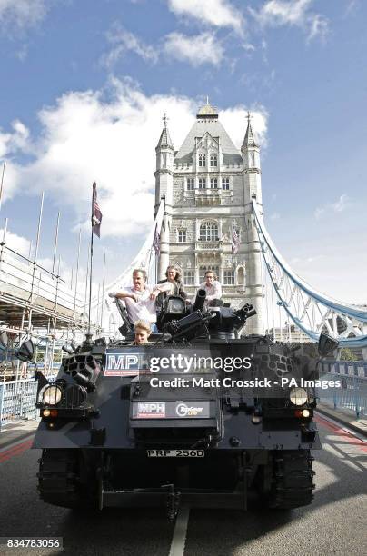 Top Gear presenters, Jeremy Clarkson, James May and Richard Hammond, are driven across Tower Bridge in a stretched 434 Armoured Personel Carrier, to...