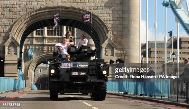 Top Gear presenters, Jeremy Clarkson, James May and Richard Hammond, are driven across Tower Bridge in a stretched 434 Armoured Personel Carrier, to...
