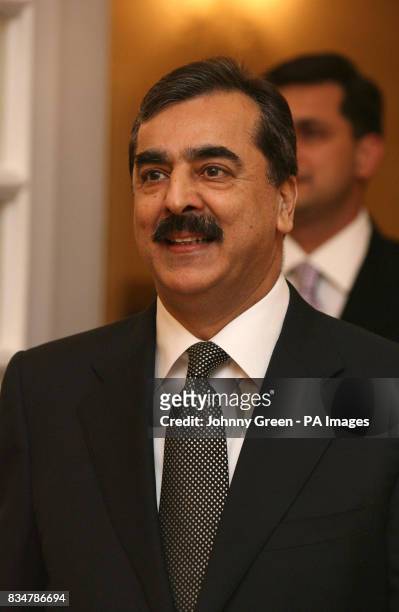 Pakistani Prime Minister Yousuf Raza Gilani arrives to meet the Conservative Party leader David Cameron at Prime Minister's House in Islamabad,...