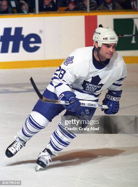 Tie Domi of the Toronto Maple Leafs turns up ice against the Colorado Avalanche during NHL game action on December 11, 1995 at Maple Leaf Gardens in...