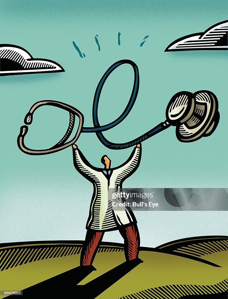 Doctor holding up a giant stethoscope