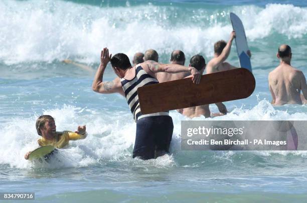 Competitors take part in the Skinners Brewery World Bellyboard Championships hosted by the National Trust at Chapel Porth Beach, near St Agnes.