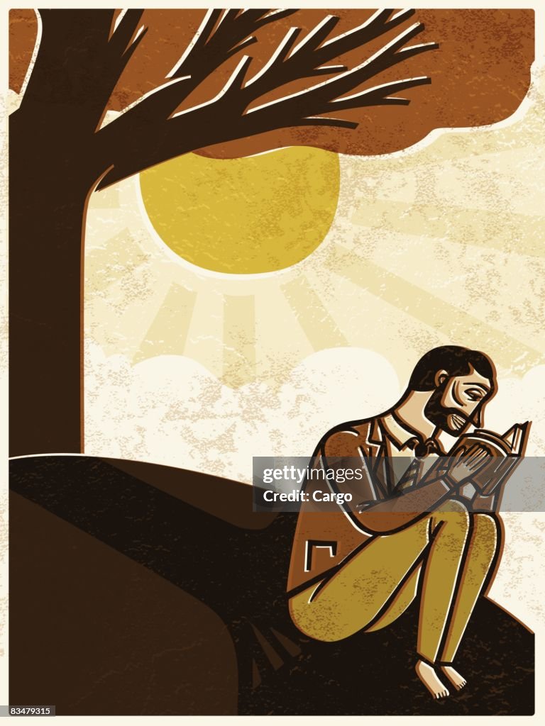 A man reading a book, with a tree nearby