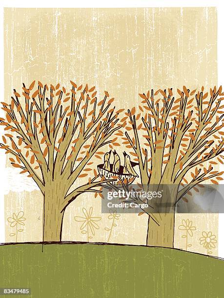 two trees holding a bird nest - foster stock illustrations