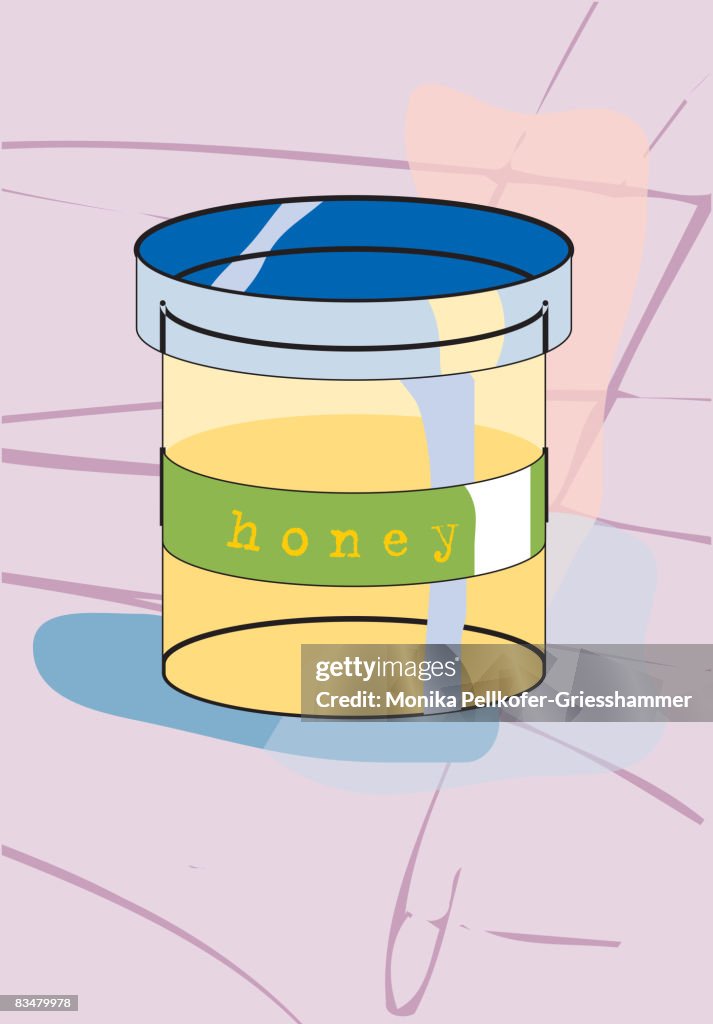 Closeup of a honey jar