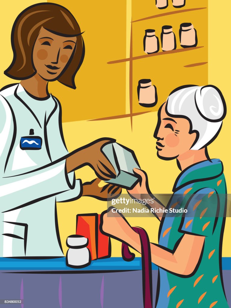A pharmacist showing a product to an elderly patron