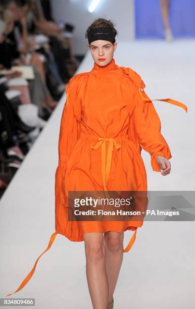 Model wears a creation by designer Betty Jackson, during London Fashion Week at the BFC Tent, Natural History Museum, West Lawn, Cromwell Road, SW7.