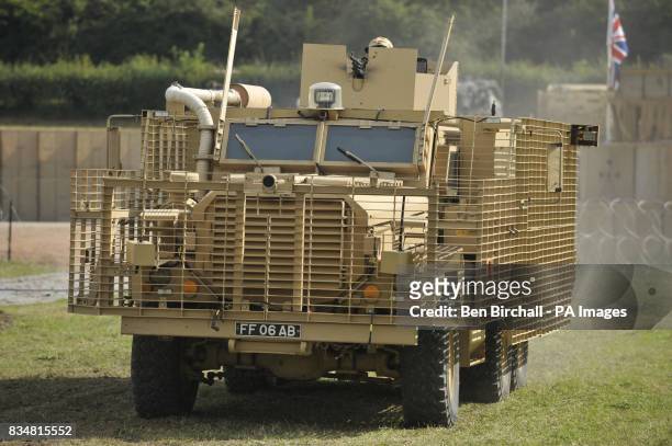 Mastiff 6x6 wheel drive patrol vehicle with body armour in the form of heavy duty metal grids that cause anti-tank weapons to detonate further from...