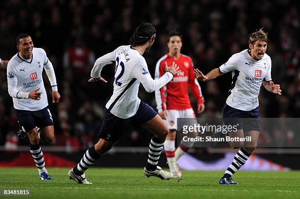 David Bentley of Tottenham Hotspur celebrates scoring with his team mates during the Barclays Premier League match between Arsenal and Tottenham...