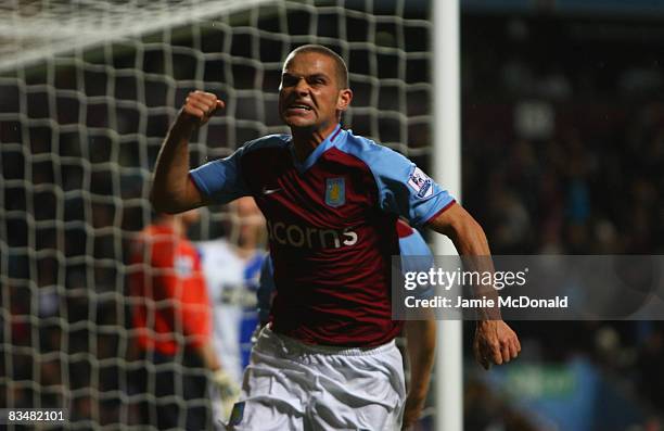 Luke Young of Aston Villa celebrates his goal during the Barclays Premier League match between Aston Villa and Blackburn Rovers at Villa Park on...