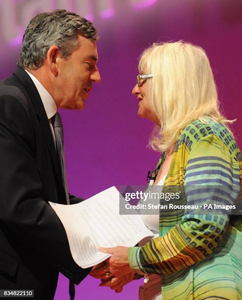 Prime Minister Gordon Brown and Aneira Thomas, the first baby to be born on the NHS, during the Labour Party's annual conference in Manchester.