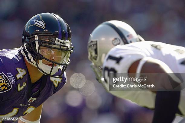 Haruki Nakamura of the Baltimore Ravens gets ready on the line of scrimmage against Hiram Eugene of the Oakland Raiders at M&T Bank Stadium on...