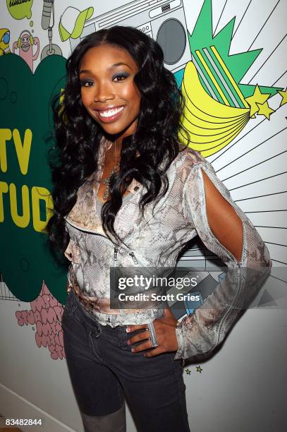 Singer Brandy poses backstage during MTV's Total Request Live at the MTV Times Square Studios October 29, 2008 in New York City.