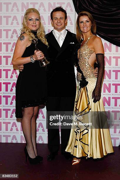 'Most Popular Newcomer' award winner Rita Simons poses with rugby player Austin Healey and professional dancer Erin Boag during the National...