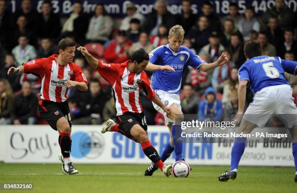 Brentford's Sam Wood has a shot on goal during the Coca-Cola League Two match at Griffin Park, Brentford.