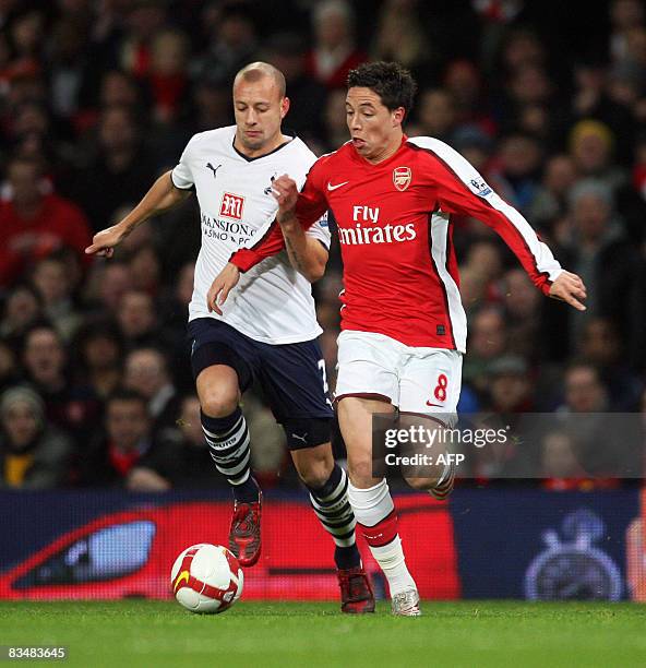 Arsenal's Samir Nasri clashes with Tottenham Hotspur's Alan Hutton during their Premiership football match in London, on October 29, 2008. AFP...