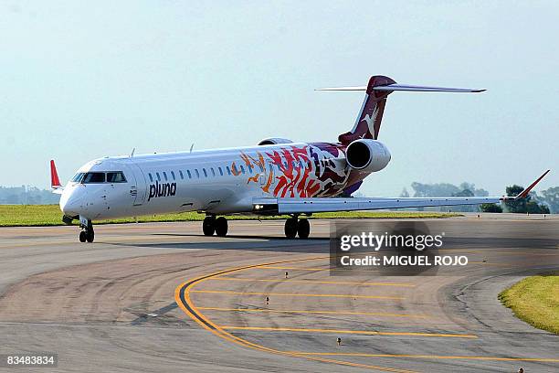 Uruguayan flagship carrier PLUNA aircraft is seen taxying along the runway at Carrasco International Airport in Montevideo on October 6, 2008. The...