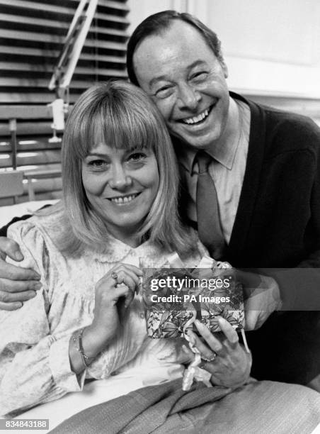 Pauline Fowler is visited in hospital by tv husband Arthur where she has been over Christmas after her hysterectomy.