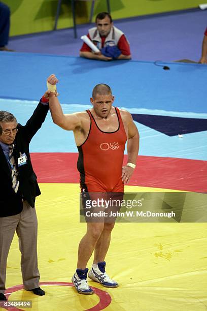 Greco-Roman Wrestling: 2004 Summer Olympics: USA Rulon Gardner victorious vs Bulgaria Sergei Moreyko during Men's 120kg match at Ano Liossia Olympic...