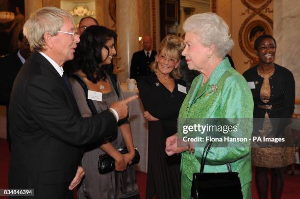 Queen Elizabeth II receives Blue Peter presenters, from left to right: John Noakes, Konnie Huq, Lesley Judd and Diane-Louise Jordan, during a...