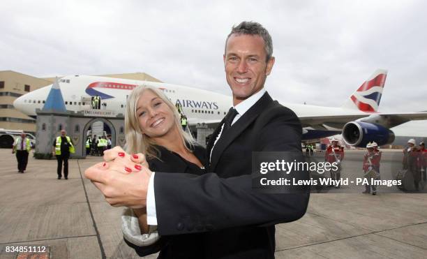 Stars of Strictly Come Dancing Mark Foster and his partner Hayley Holt dance in front of the British Airways jumbo jet at Heathrow that will be...