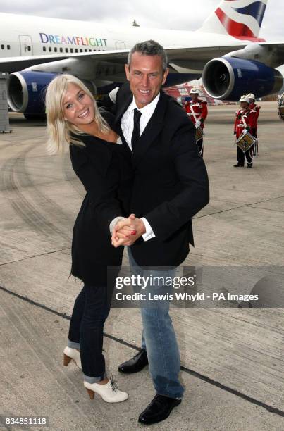 Stars of Strictly Come Dancing Mark Foster and his partner Hayley Holt dance in front of the British Airways jumbo jet at Heathrow that will be...