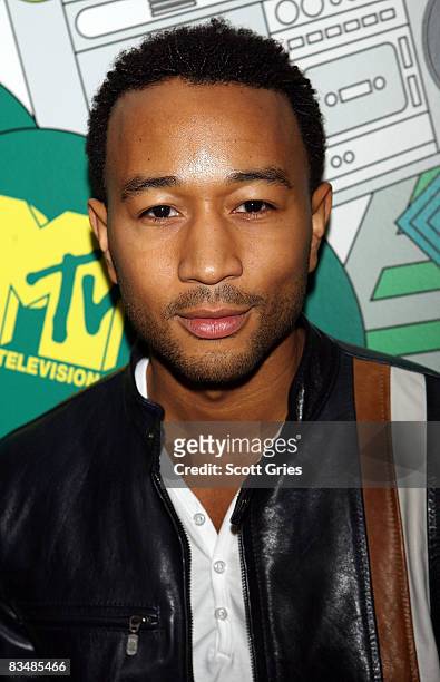 Singer John Legend poses backstage during MTV's Total Request Live at the MTV Times Square Studios October 29, 2008 in New York City.