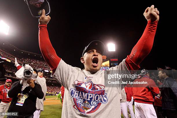 Carlos Ruiz of the Philadelphia Phillies celebrates on the firled after they won 4-3 to win the World Series against the Tampa Bay Rays during the...